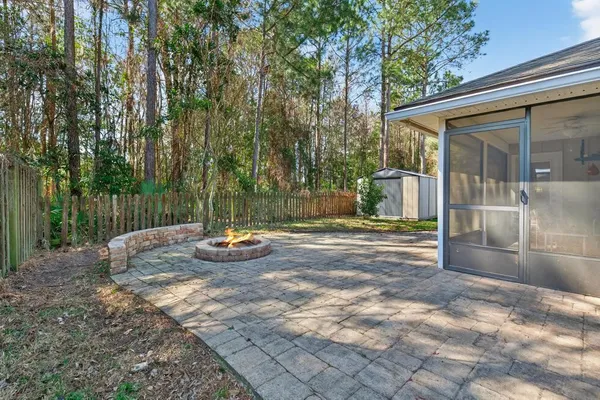 a backyard of a house with trampoline