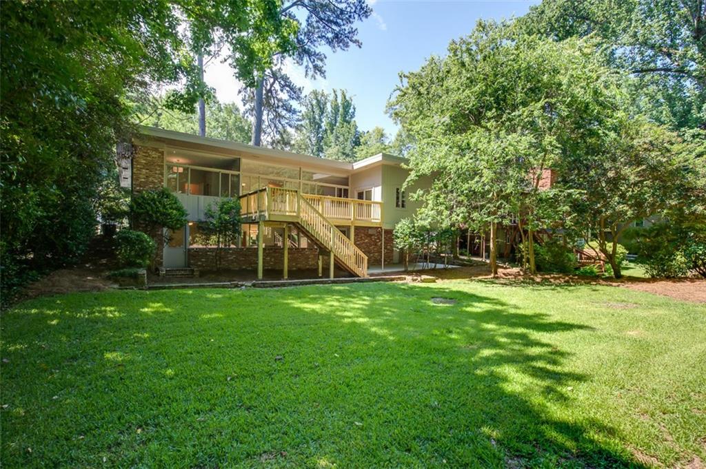 1364 Springdale Road Northeast Atlanta, GA 30306 - Photo 1 of 1 Authentic Mid-Century Modern tucked into tranquil setting in Heart of Druid Hills