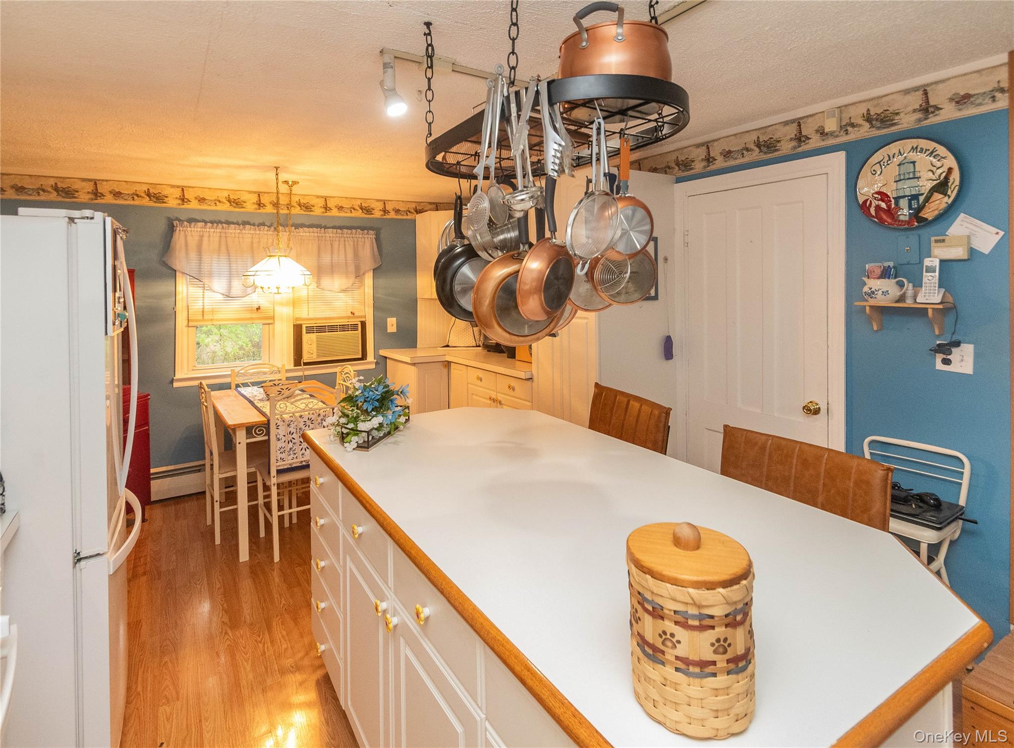 62 Thornton Road Wurtsboro, NY 12790 - Photo 14 of 30 a dining room with furniture and a chandelier