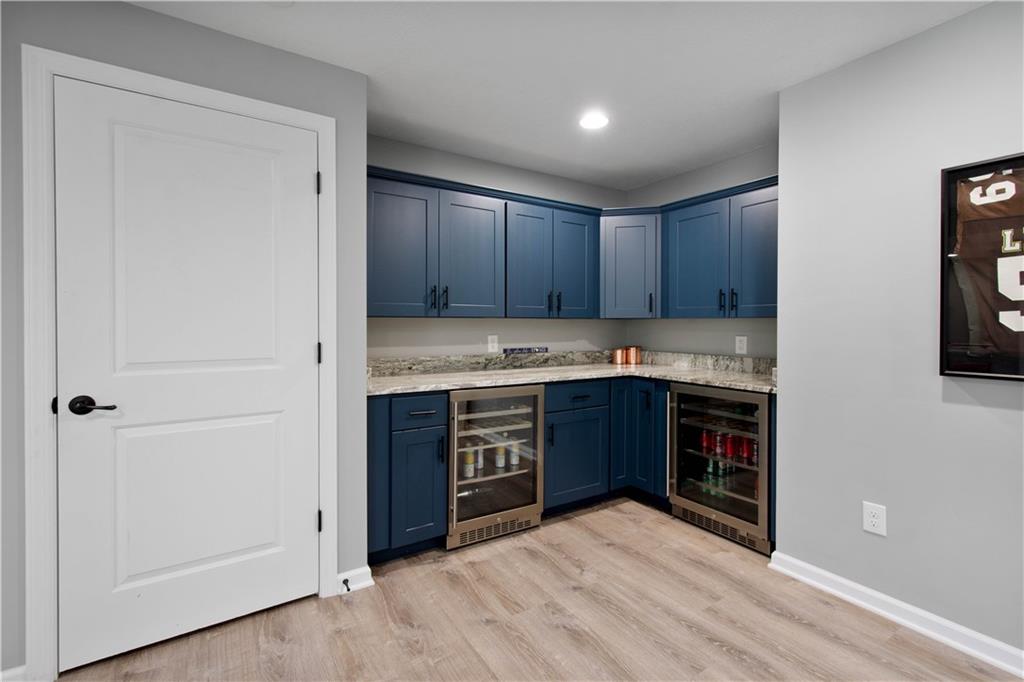 4528 Walnut Ridge Circle McDonald, PA 15057 - Photo 39 of 50 a kitchen with a refrigerator and a stove top oven
