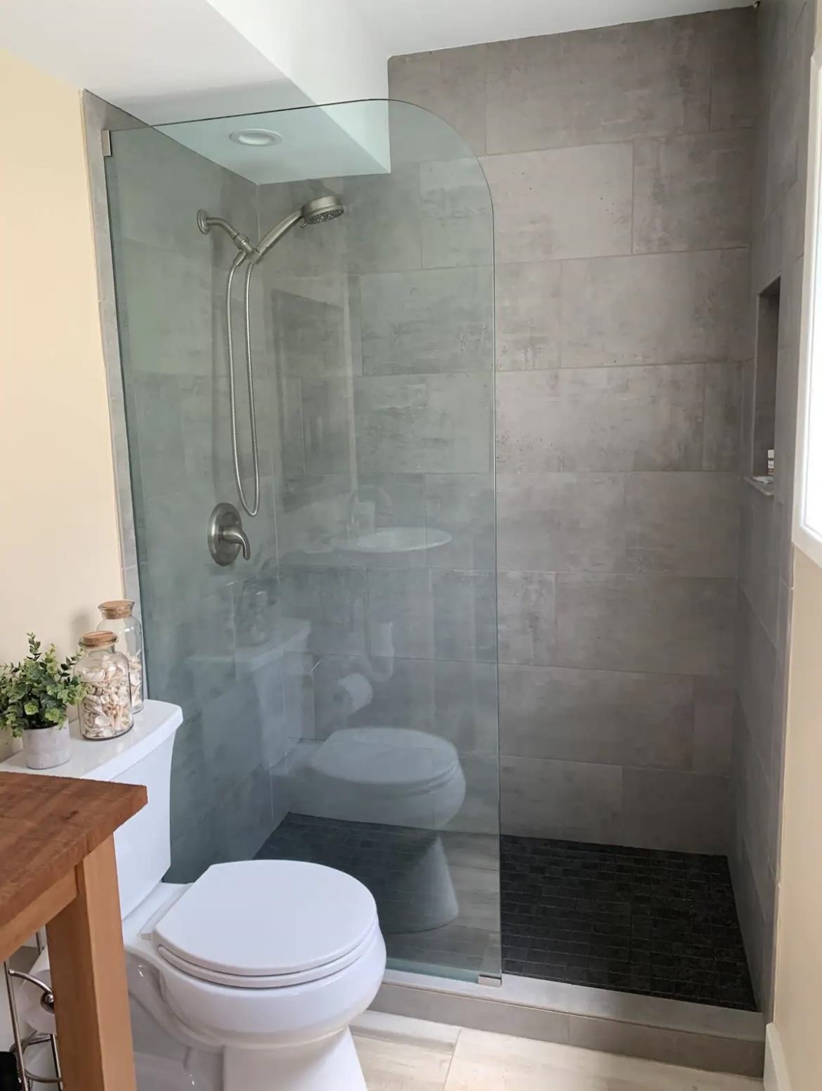 120 Hui F Road, Unit J1 Lahaina, HI 96761 - Photo 14 of 36 a bathroom with a toilet and a shower