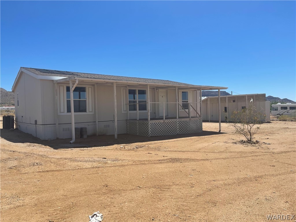 3650 Bosque Road Golden Valley, AZ 86413 - Photo 10 of 34 a view of wooden house