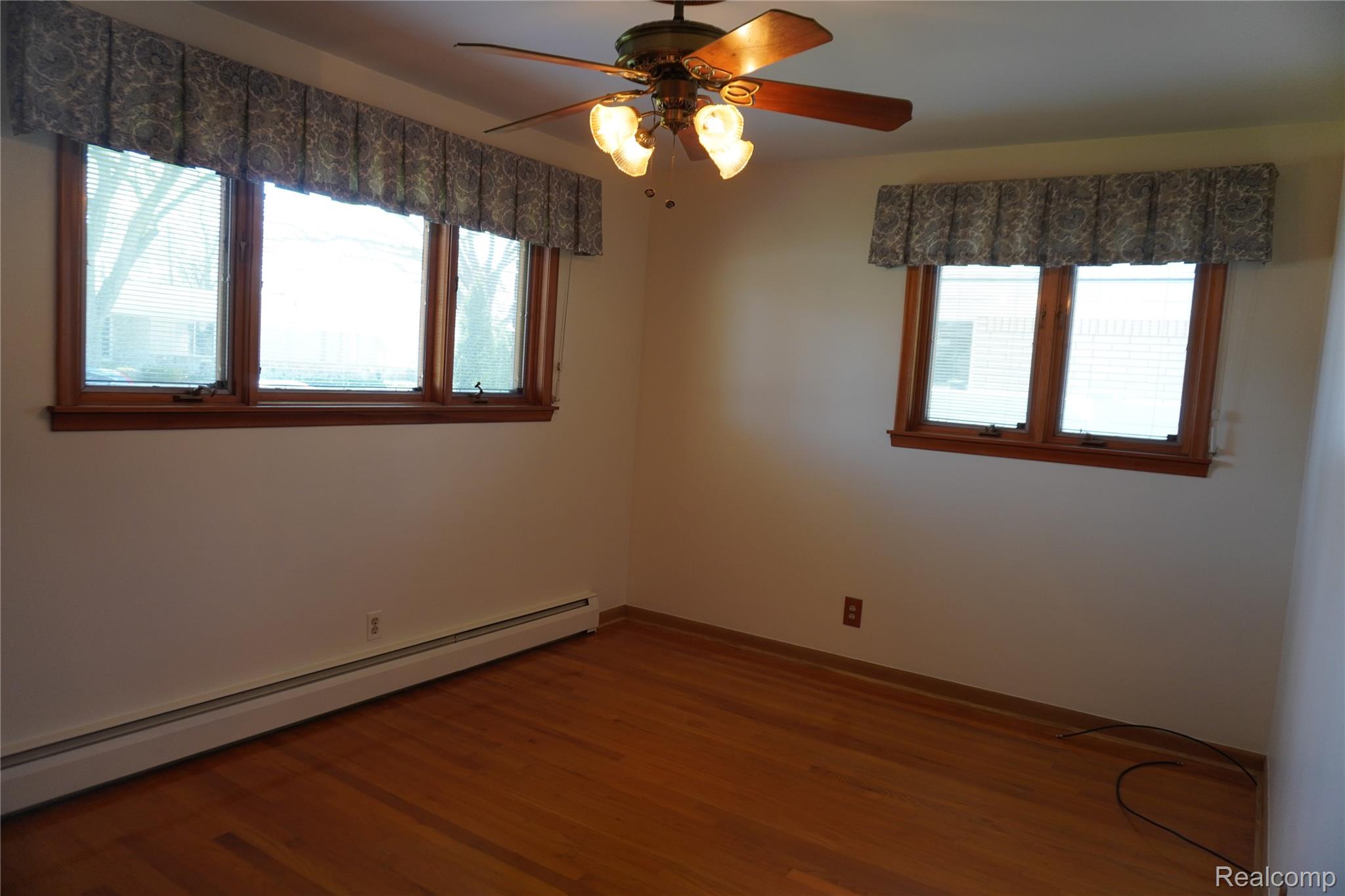 8115 Busch Street Center Line, MI 48015 - Photo 19 of 19 Bedroom with Hardwood floors, freshly painted with Pella Windows
