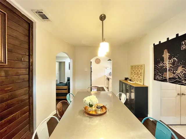 a view of a dining room with furniture