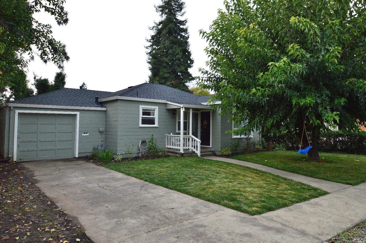 229 Gilbert Drive Santa Rosa, CA 95405 - Photo 1 of 1 front view of a house with a yard