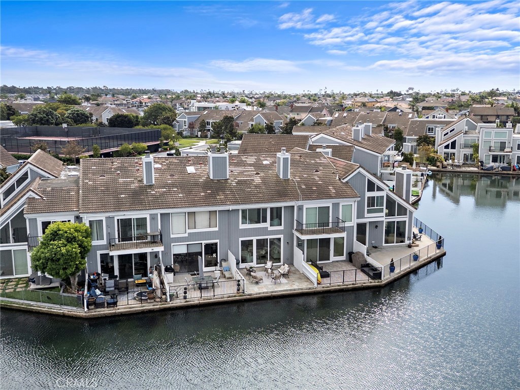 16103 St Croix Circle Huntington Beach, CA 92649 - Photo 14 of 40 a view of a lake with a building in the background