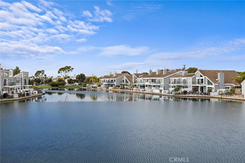 16103 St Croix Circle Huntington Beach, CA 92649 - Photo 15 of 40 a view of a lake with boats and trees in the background