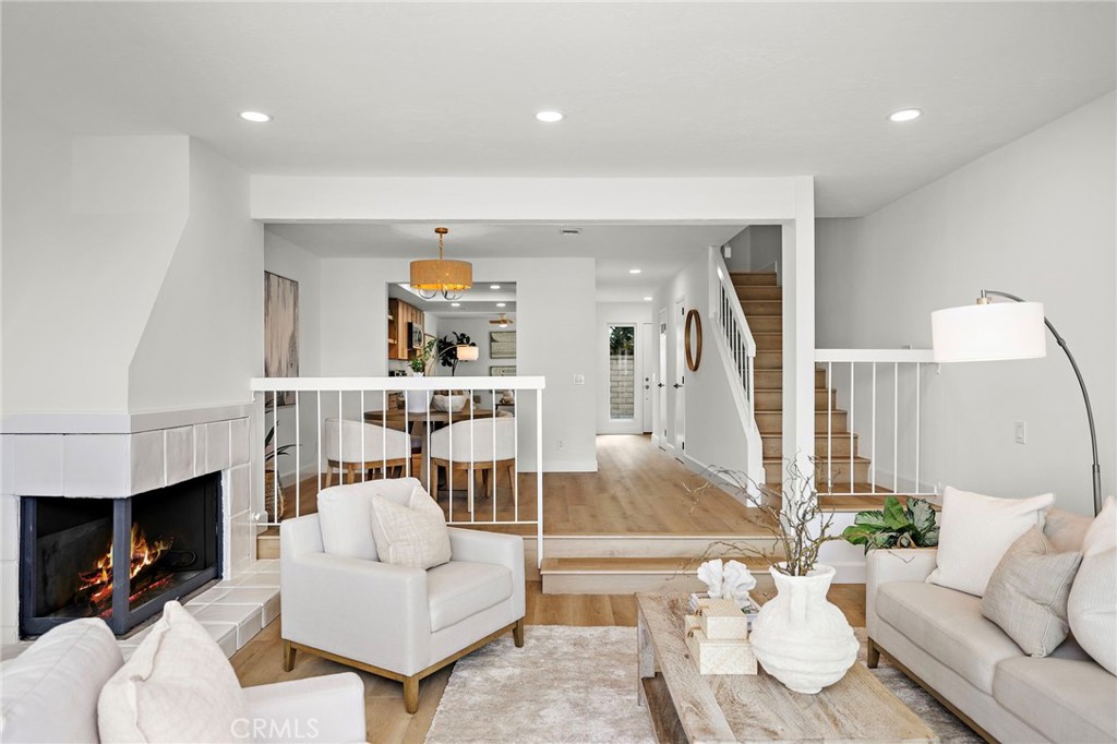 16103 St Croix Circle Huntington Beach, CA 92649 - Photo 17 of 40 a living room with furniture and a wooden floor