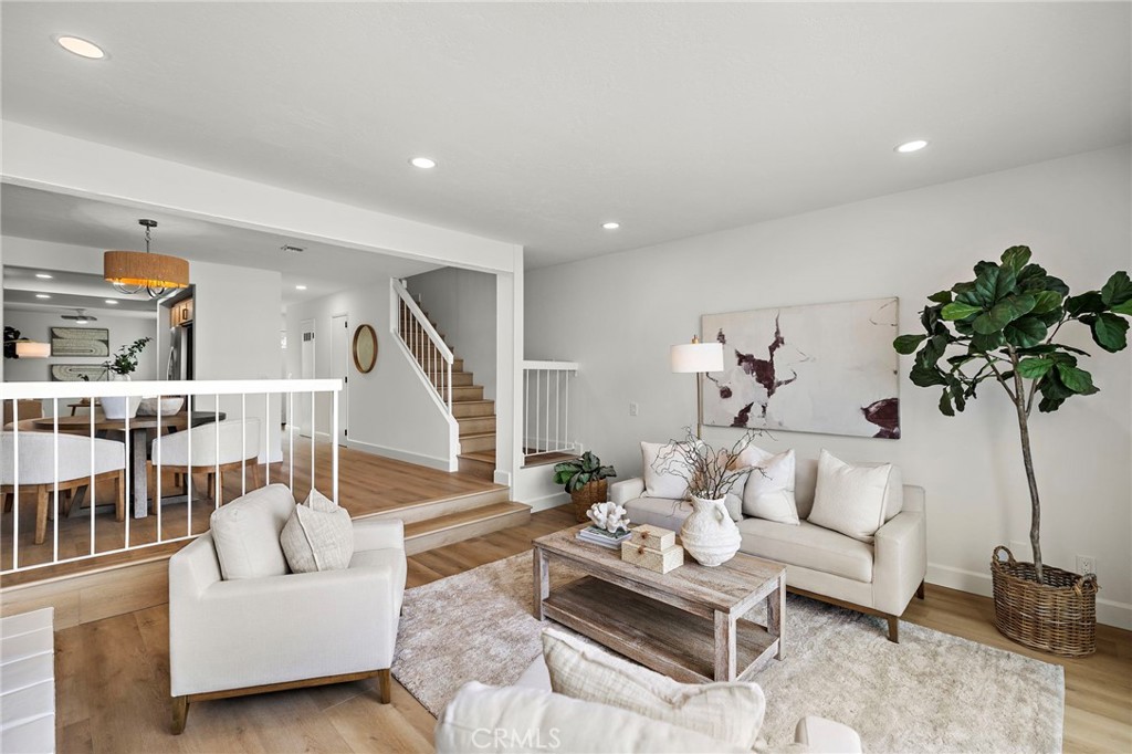 16103 St Croix Circle Huntington Beach, CA 92649 - Photo 19 of 40 a living room with furniture and a potted plant