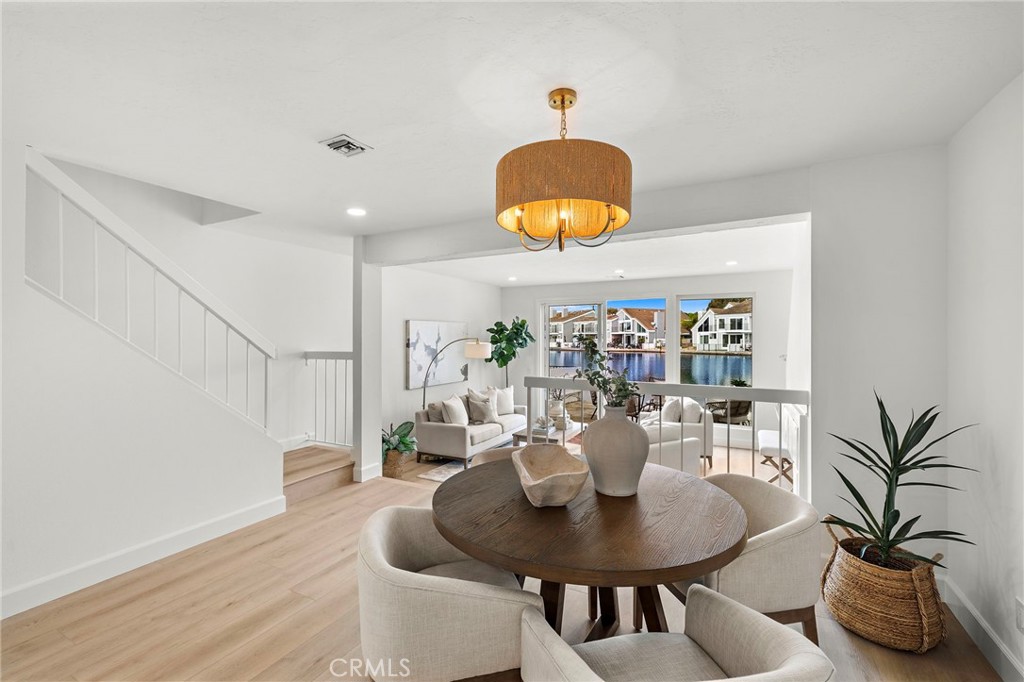 16103 St Croix Circle Huntington Beach, CA 92649 - Photo 22 of 40 a living room with furniture and a potted plant