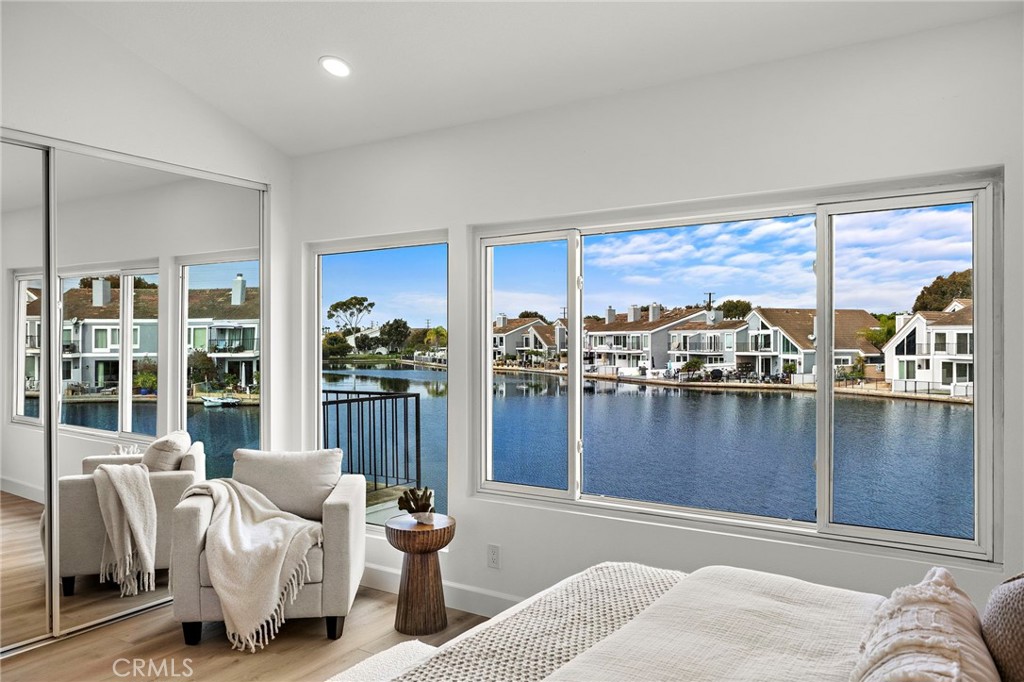 16103 St Croix Circle Huntington Beach, CA 92649 - Photo 24 of 40 a living room with furniture and large windows