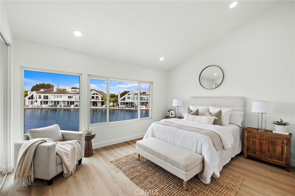 16103 St Croix Circle Huntington Beach, CA 92649 - Photo 25 of 40 a bedroom with a bed and window