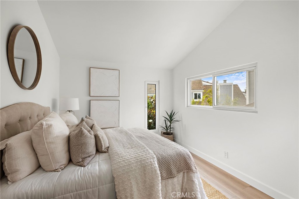 16103 St Croix Circle Huntington Beach, CA 92649 - Photo 35 of 40 a bedroom with bed and a window