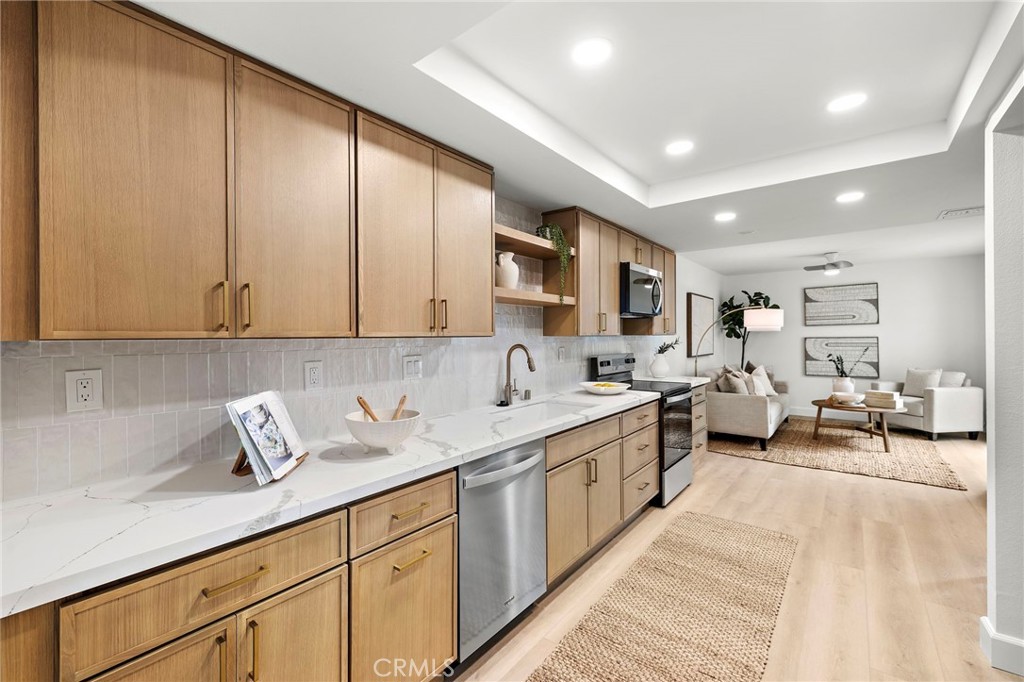16103 St Croix Circle Huntington Beach, CA 92649 - Photo 6 of 40 a kitchen with lots of counter top space