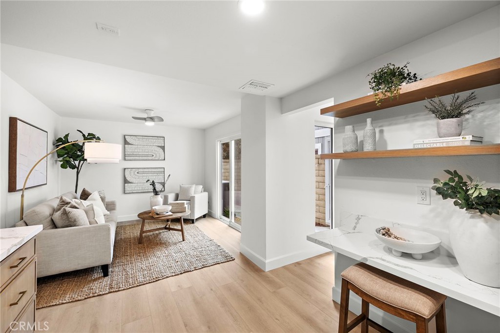 16103 St Croix Circle Huntington Beach, CA 92649 - Photo 7 of 40 a living room with furniture and wooden floor