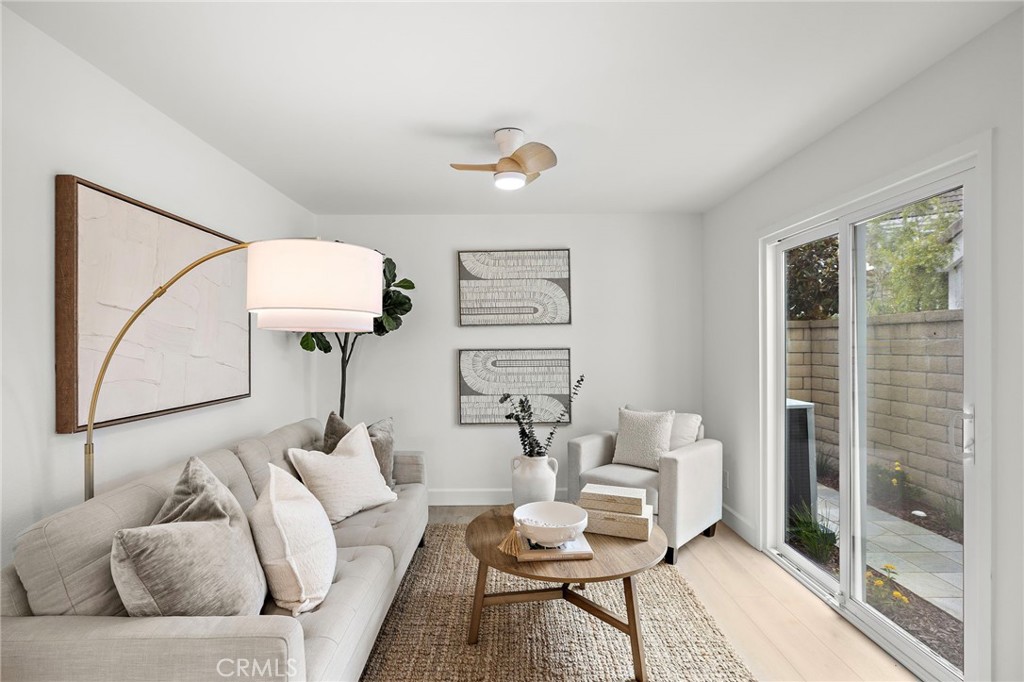16103 St Croix Circle Huntington Beach, CA 92649 - Photo 8 of 40 a living room with furniture and a window
