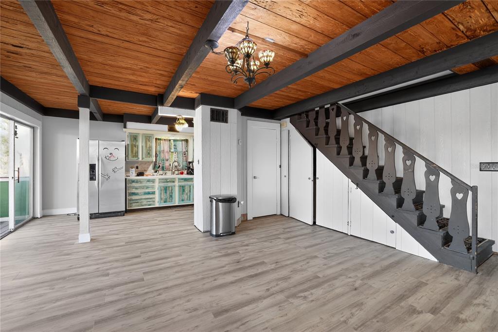 8111 North Mobley Road Odessa, FL 33556 - Photo 15 of 42 a view of an empty room with wooden floor