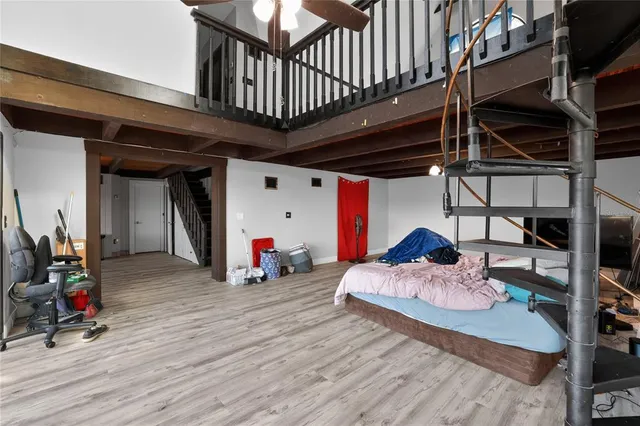 a bathroom with a bathtub and shower