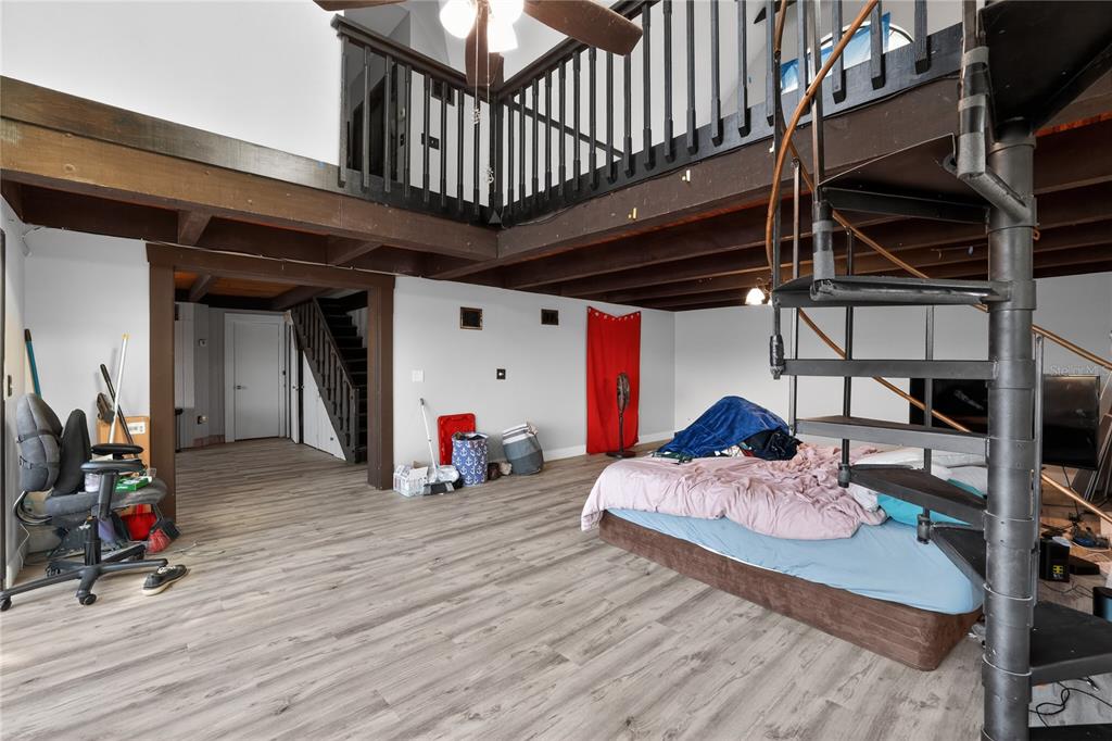 8111 North Mobley Road Odessa, FL 33556 - Photo 22 of 42 a view of a room with wooden deck