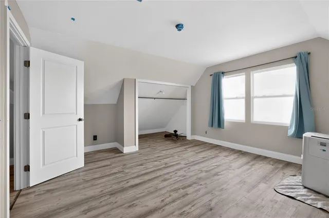 a view of storage and utility room with washer and dryer
