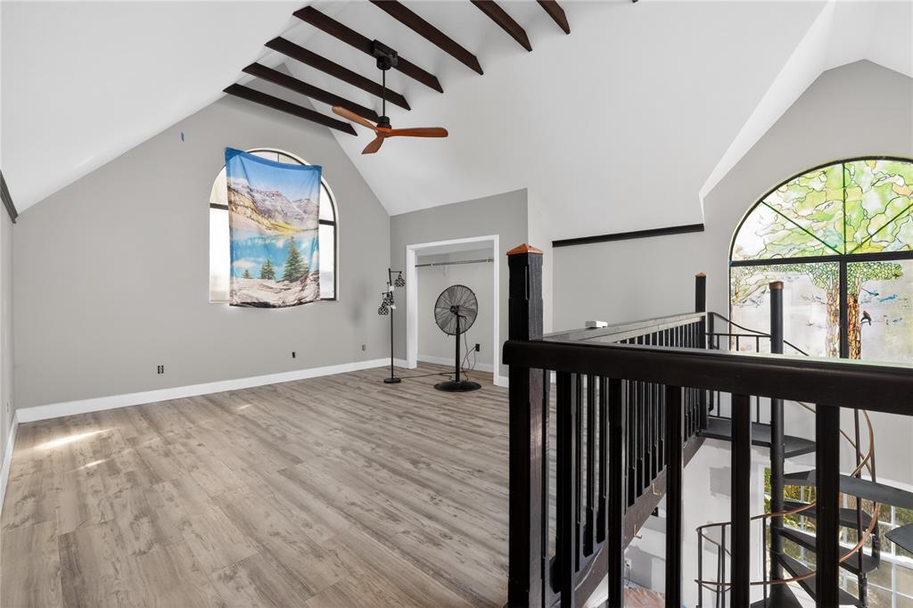 8111 North Mobley Road Odessa, FL 33556 - Photo 40 of 42 a view of a livingroom with wooden floor and a large window