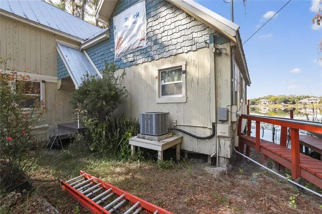 a view of a park with large trees