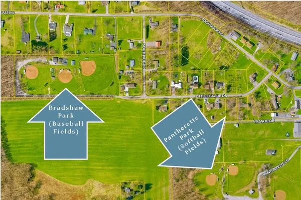 a view of a sign board with an outdoor space