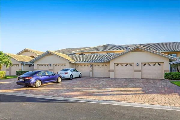 a view of a car in front of house