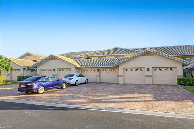 a view of a car in front of house