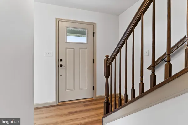 a view of an entryway with staircase