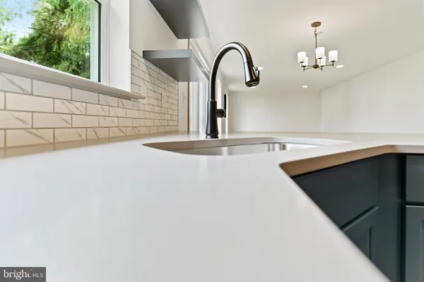 a close view of a faucet a sink and tap