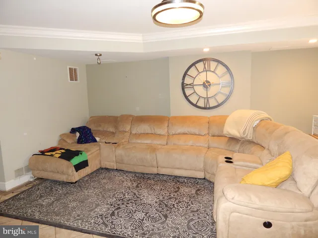 a living room with hard wood floor