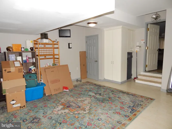 a view of a livingroom with storage & utility