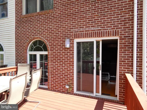 a view of a brick wall with windows