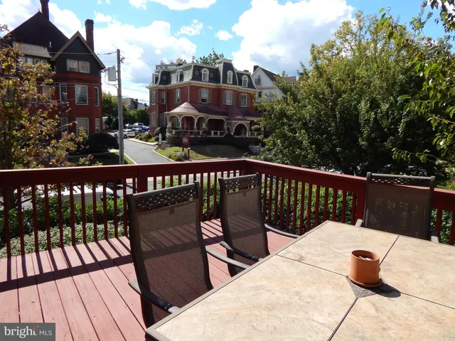 a view of a chairs on the roof deck