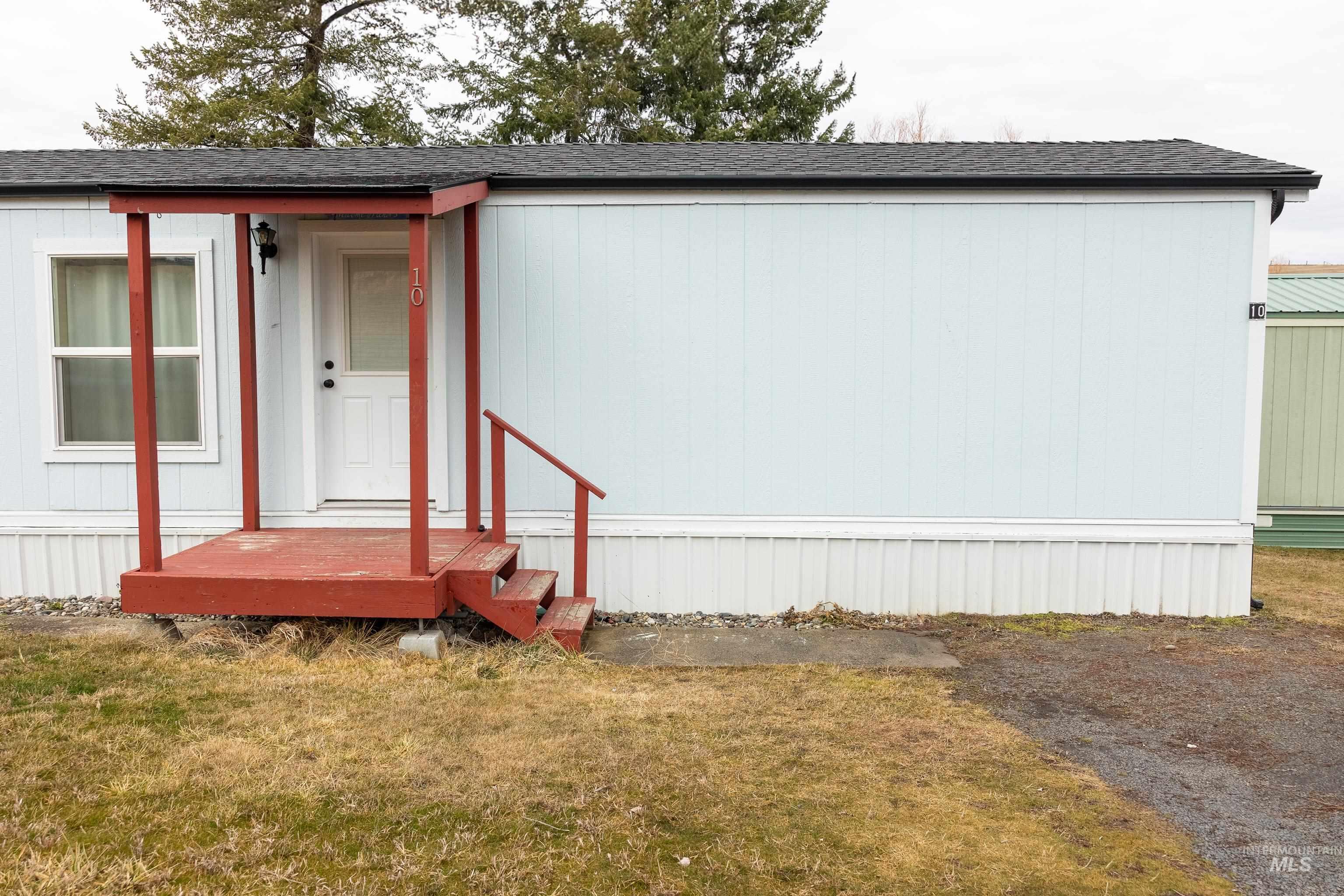 4325 Lenville Road, Unit 10 Moscow, ID 83843 - Photo 2 of 21 Entrance to property with a yard and a shingled roof