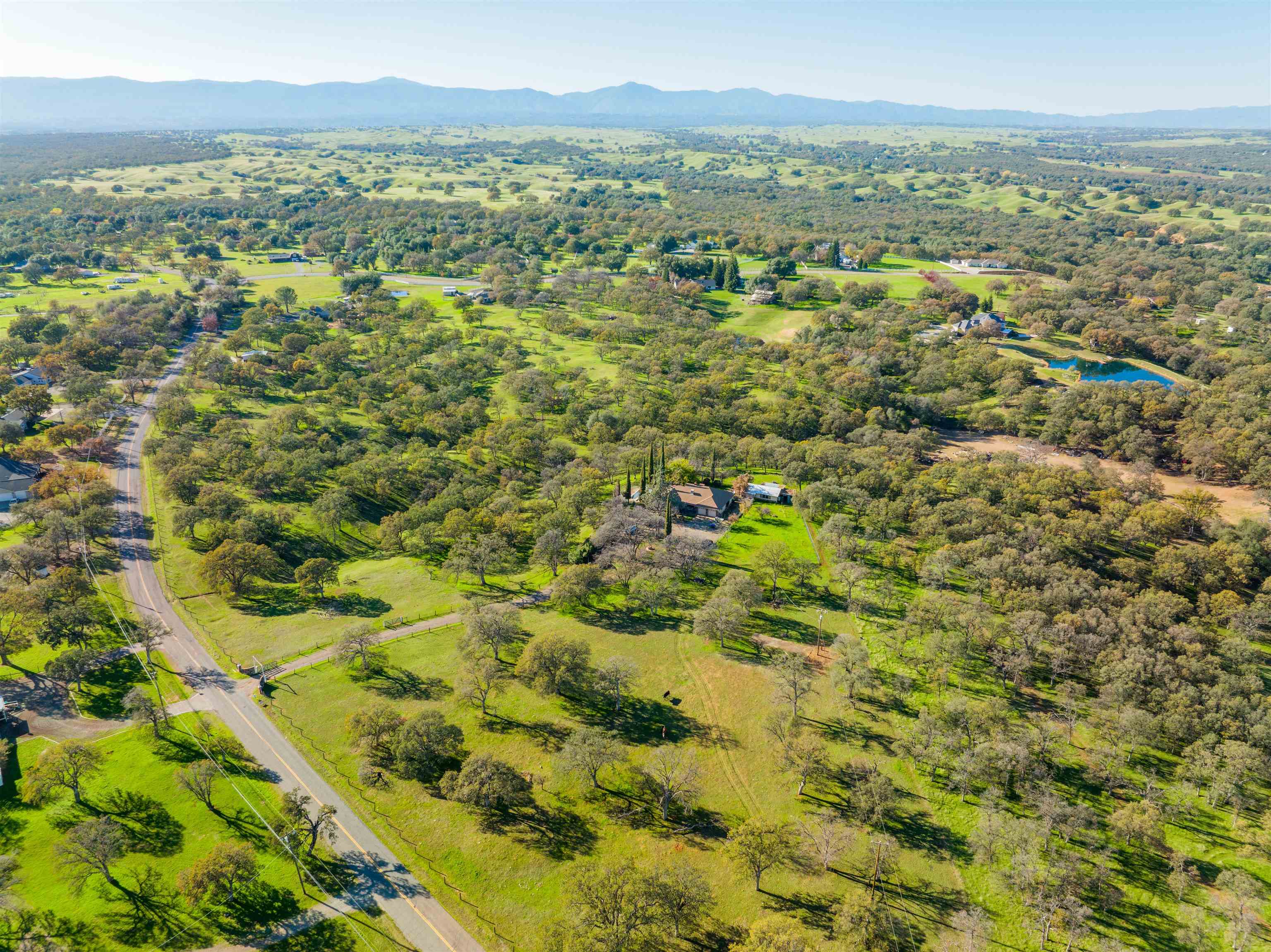 19050 Ridge Road Red Bluff, CA 96080 - Photo 34 of 36 a view of a city with lush green forest