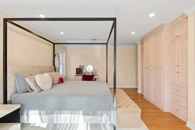 a bathroom with a double vanity sink mirror and shower