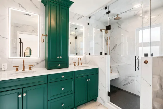 a kitchen with stainless steel appliances granite countertop a stove and a wooden floors