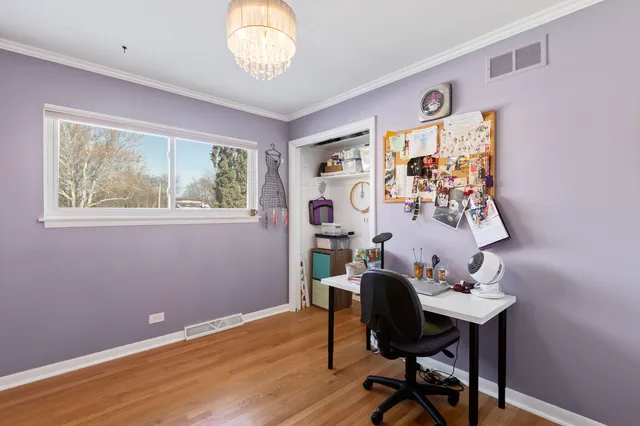 a bathroom with a sink and mirror with toilet