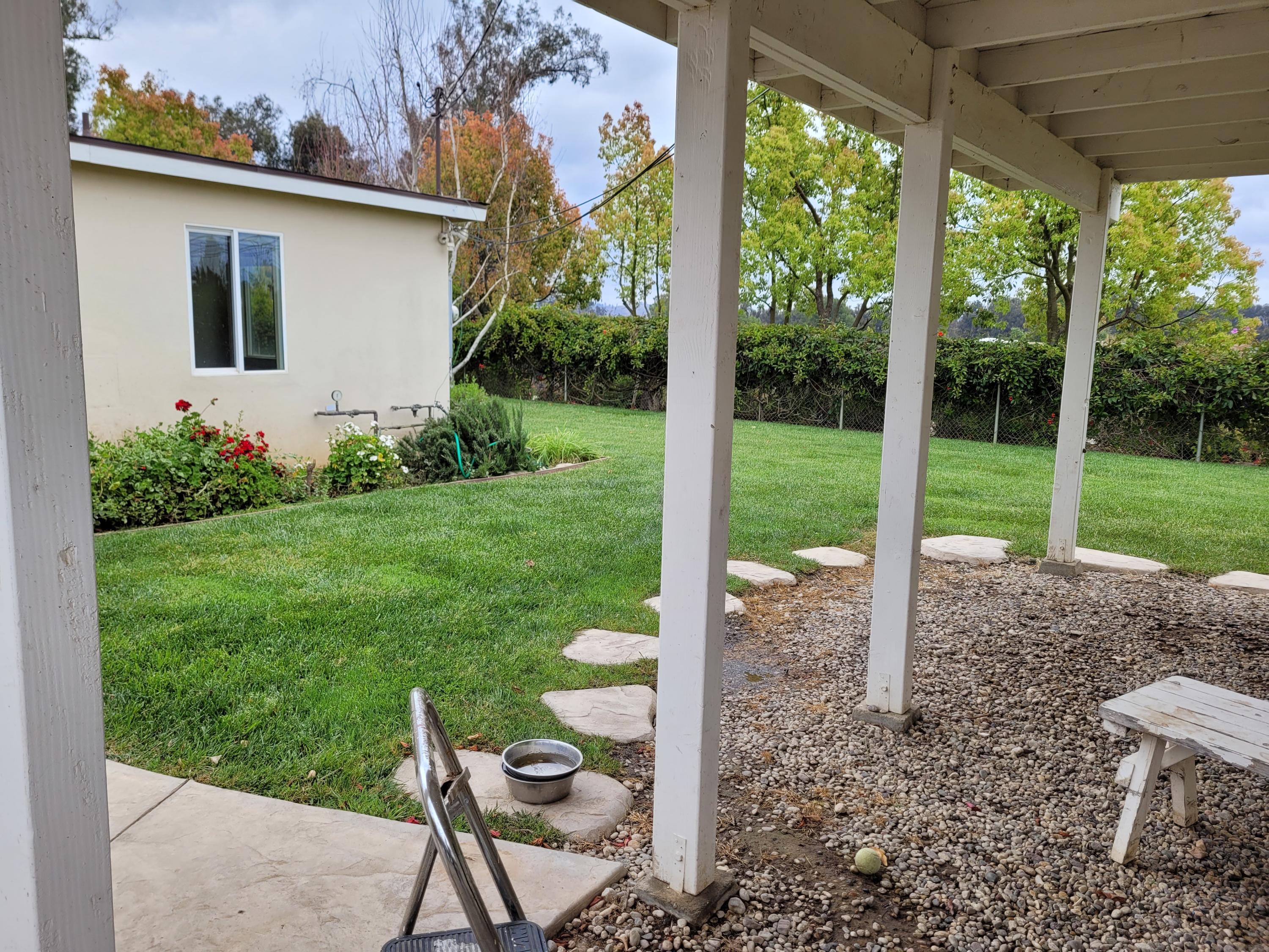 8614 Stockton Road Moorpark, CA 93021 - Photo 13 of 13 a view of backyard with large trees and plants