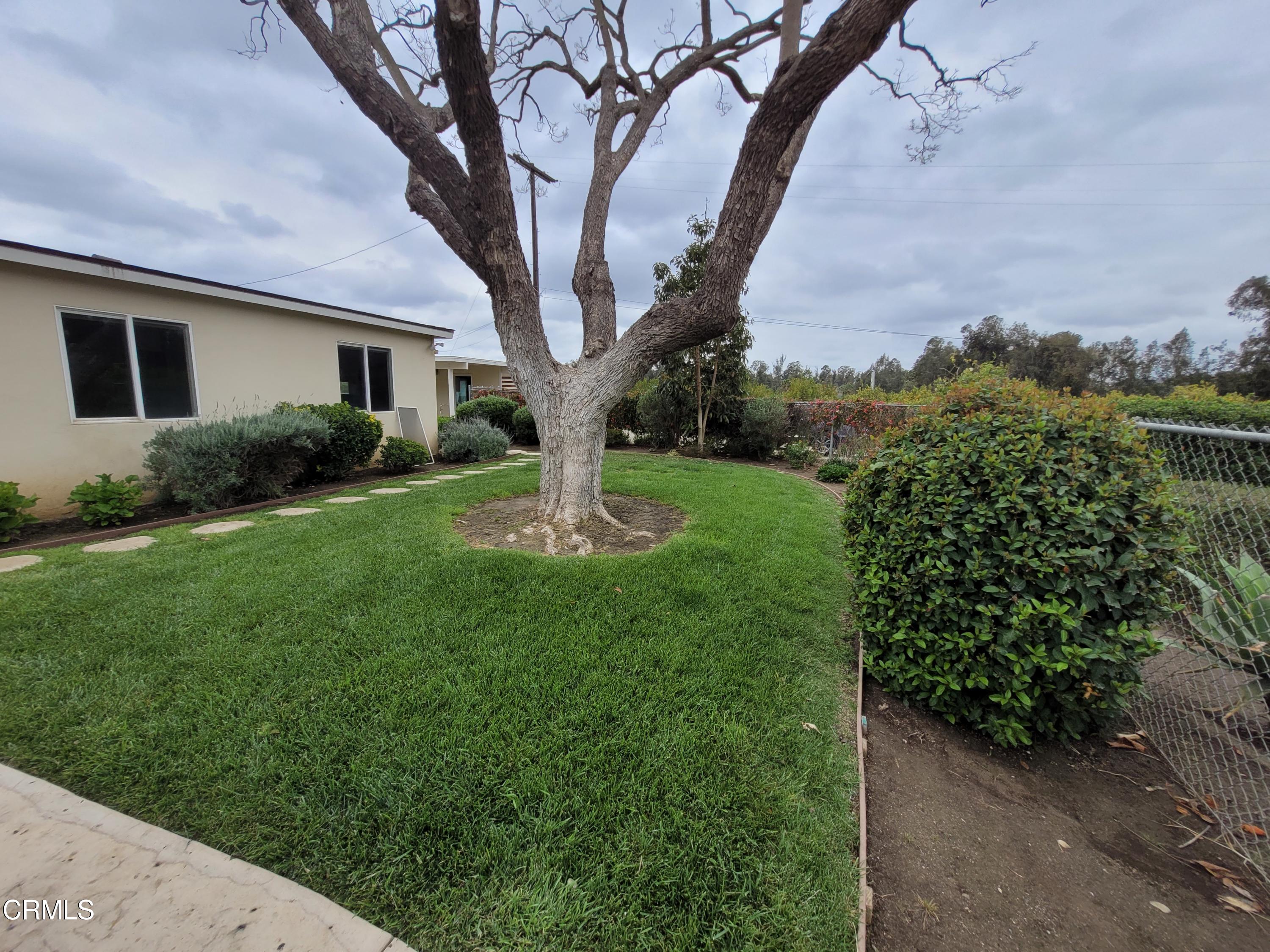 8614 Stockton Road Moorpark, CA 93021 - Photo 5 of 13 a view of a house with a backyard
