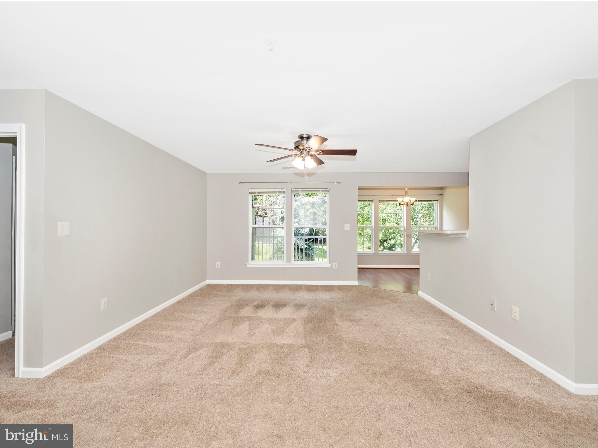 25910 Ridge Manor Drive, Unit 1000G Damascus, MD 20872 - Photo 5 of 41 Living Room