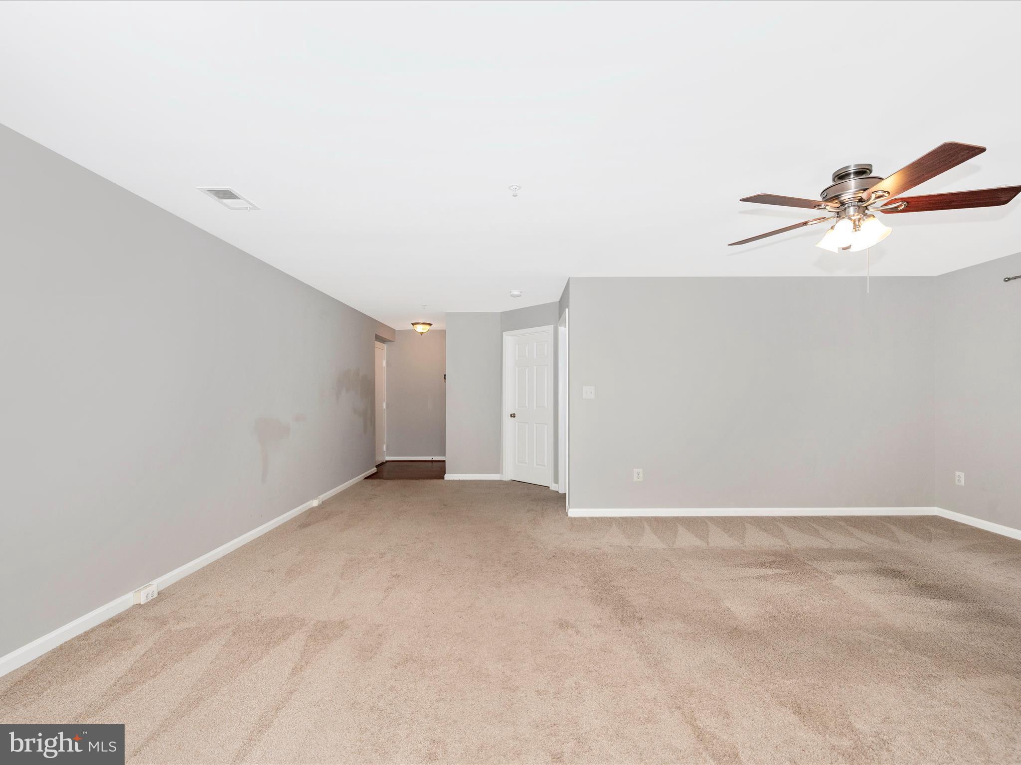 25910 Ridge Manor Drive, Unit 1000G Damascus, MD 20872 - Photo 7 of 41 Living Room