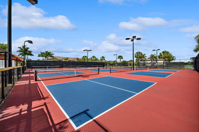 9560 Trevi Court, Unit 4812 Naples, FL 34113 - Photo 25 of 45 a view of an outdoor space with swimming pool