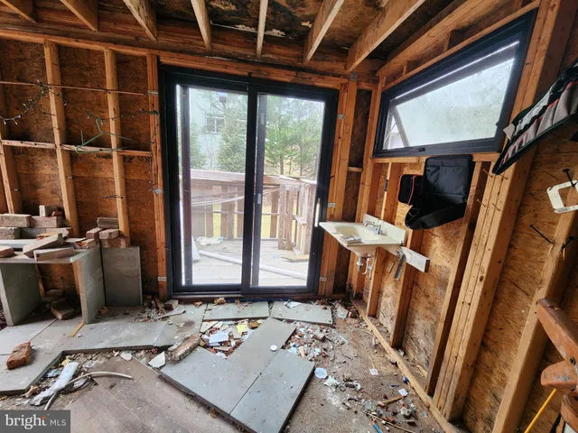 a room with furniture and a window