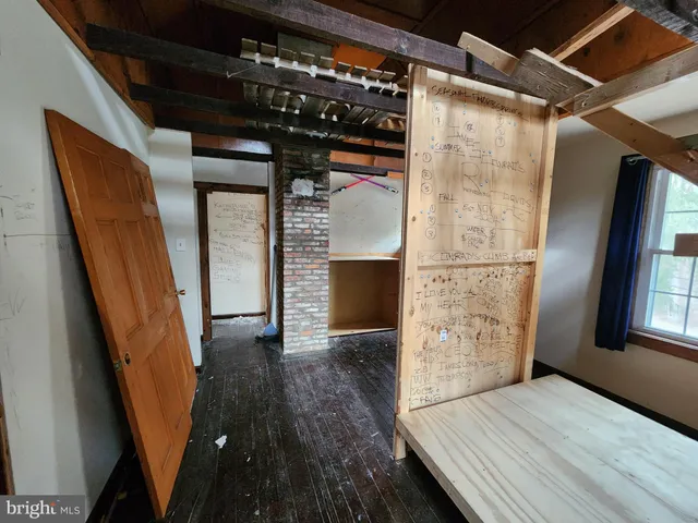 a view of entryway with wooden floor