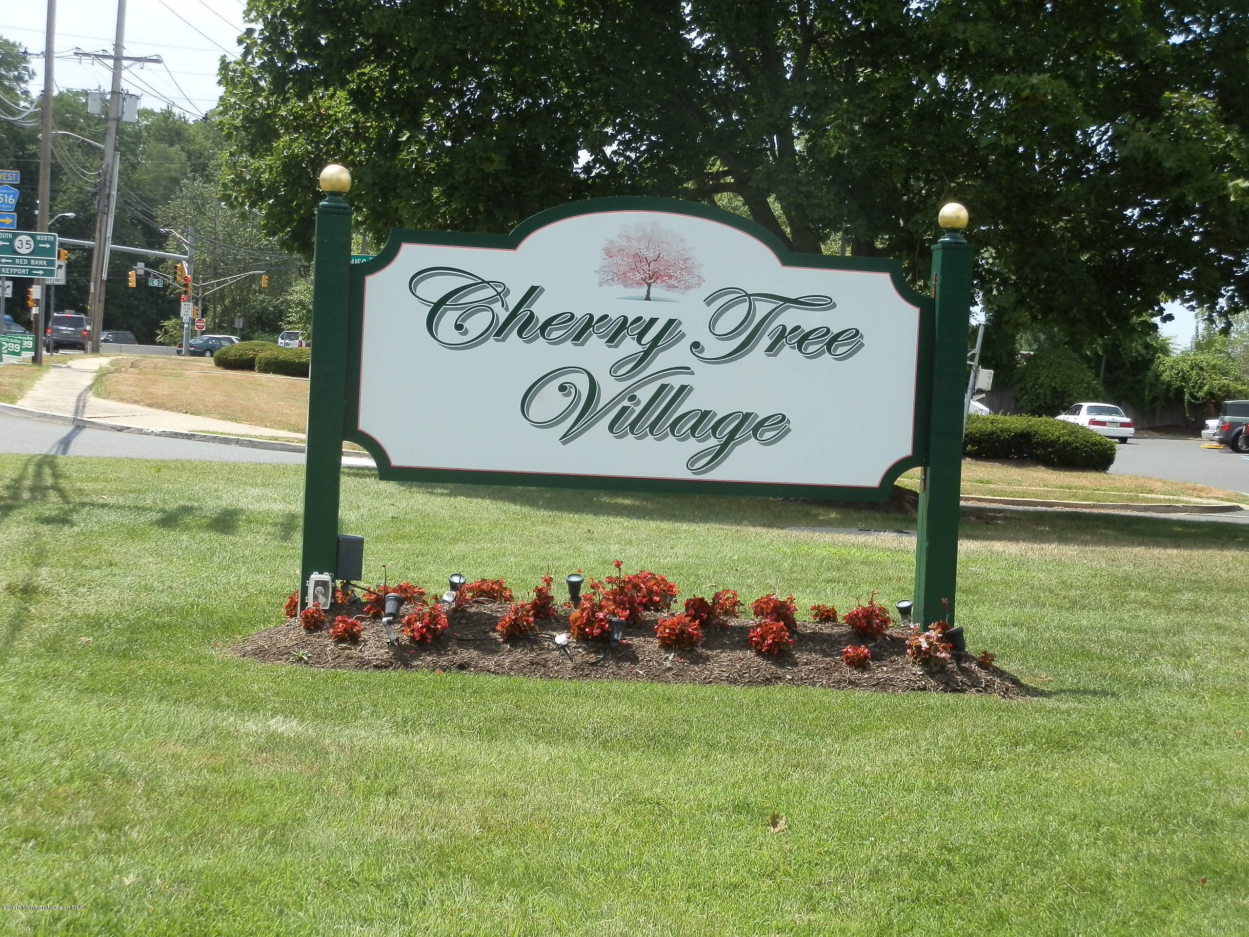 423 Middlewood Road Middletown, NJ 07748 - Photo 21 of 24 a view of a park with welcome board