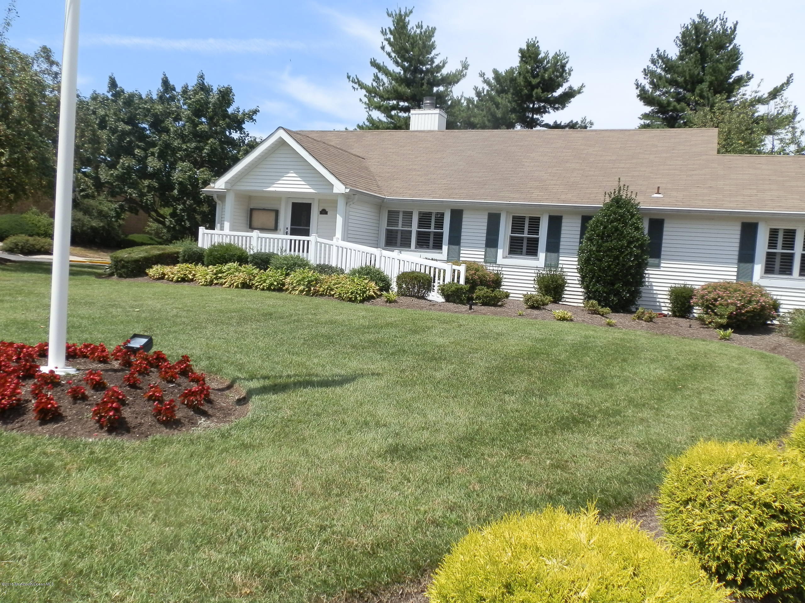 423 Middlewood Road Middletown, NJ 07748 - Photo 24 of 24 a front view of a house with garden