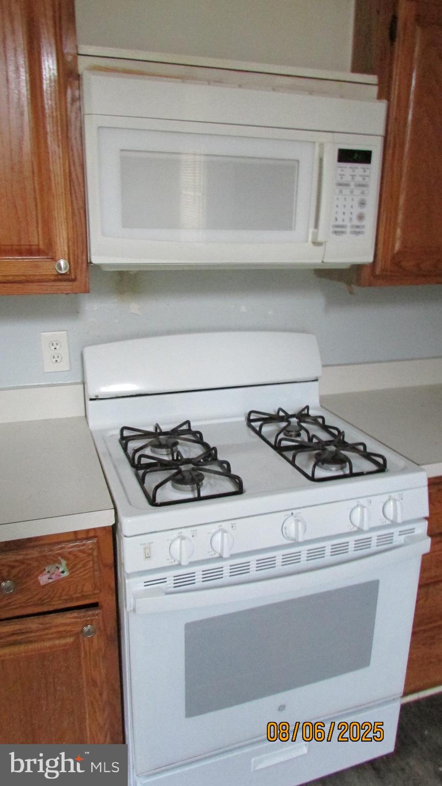 4724 Branchville Road College Park, MD 20740 - Photo 16 of 41 a stove top oven sitting inside of a kitchen